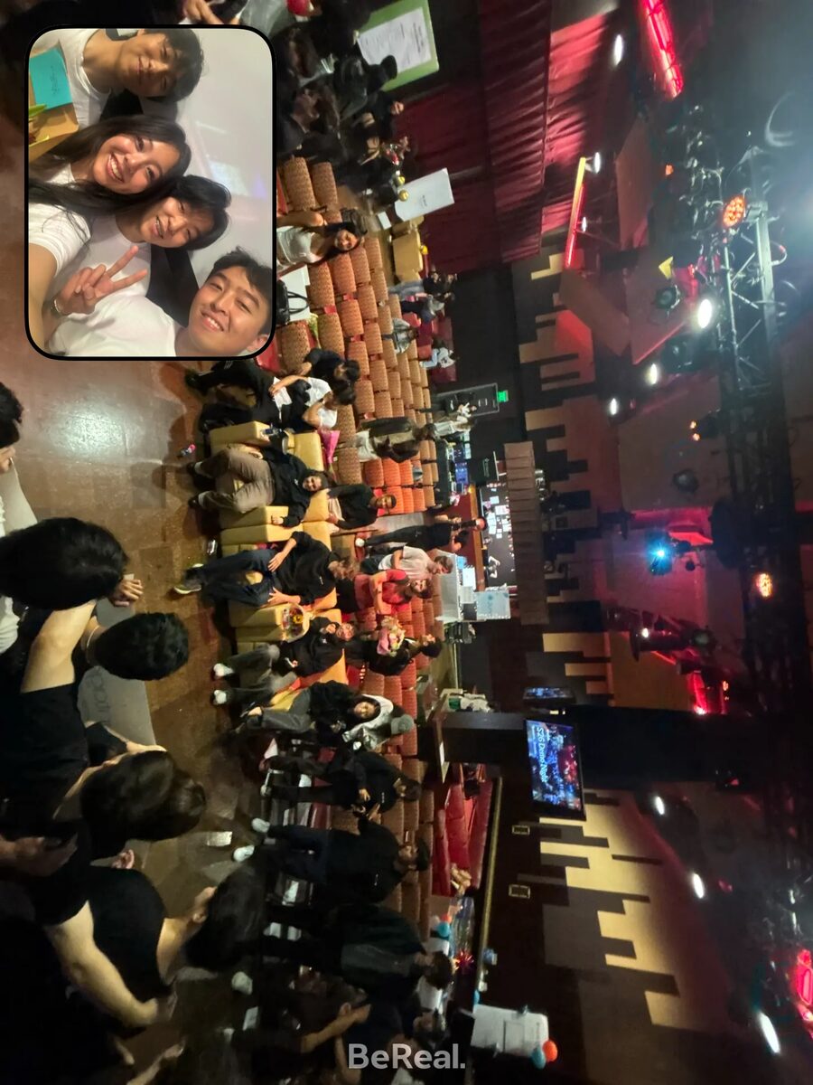 Backstage group photo before a demo night event in a theater