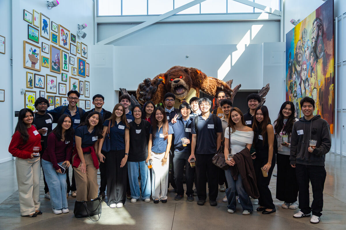 The ProductSC x Riot Games team in the Riot lobby, in front of the giant bear sculpture